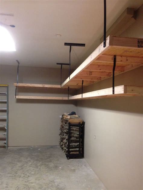 diy garage shelves with metal brackets and plywood|homemade garage shelving.